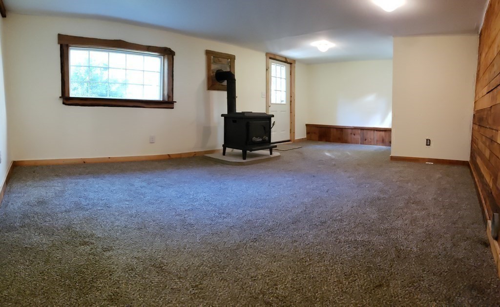4 Pleasant Street Huntington, MA 01050 - Photo 33 of 38 a room with gym equipment and a window