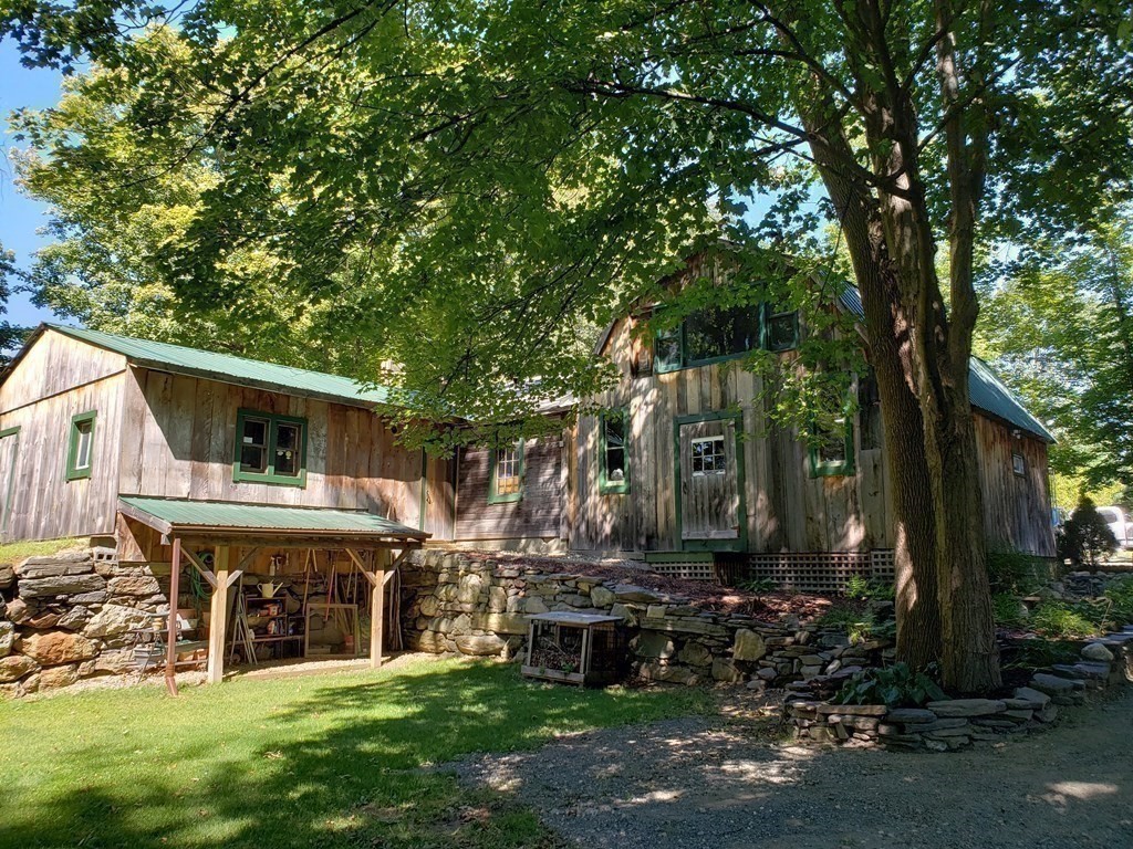 4 Pleasant Street Huntington, MA 01050 - Photo 5 of 38 a view of a house with backyard and garden