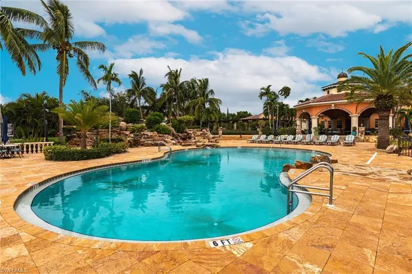 a view of a swimming pool with a garden