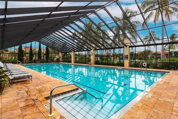 a view of swimming pool with a patio