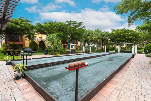 swimming pool view with a garden space