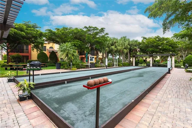 swimming pool view with a garden space