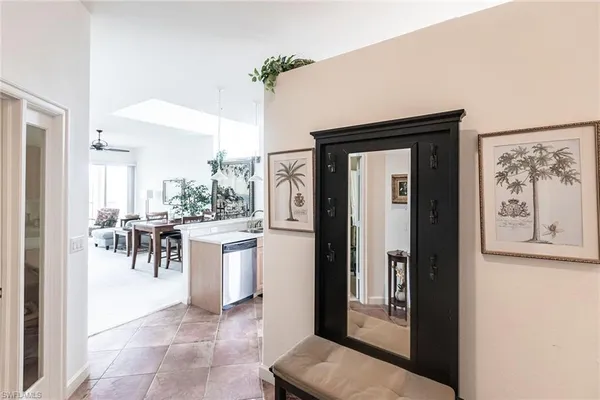 a open kitchen with stainless steel appliances granite countertop a refrigerator and a sink