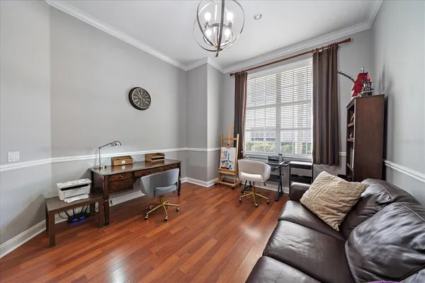 a spacious bathroom with a double vanity sink mirror and bathtub