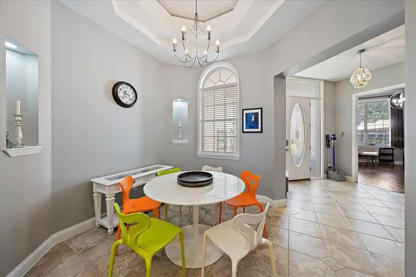 a kitchen with a stove sink and a refrigerator