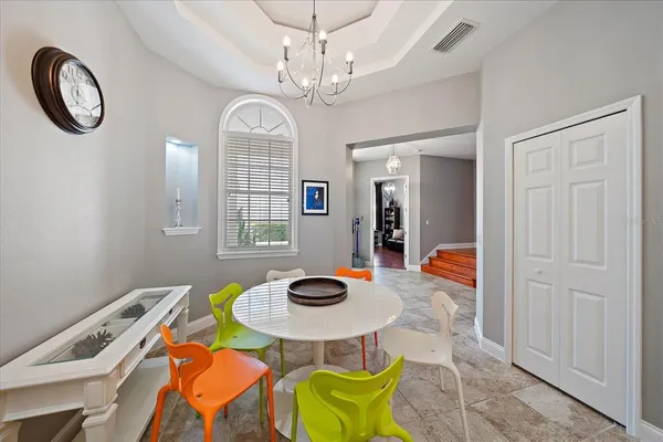 a view of a kitchen with a sink and microwave