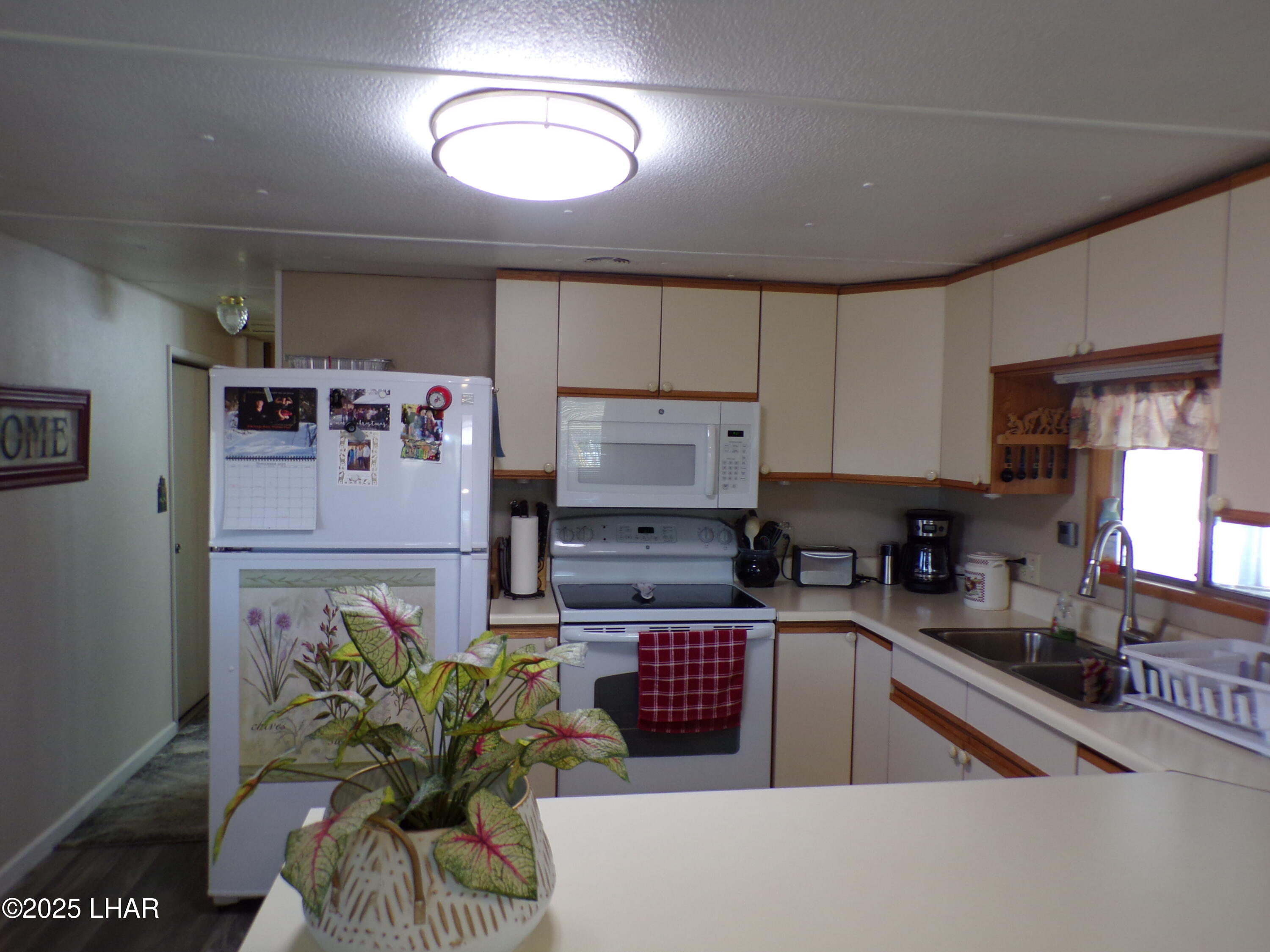 25569 Ochoco Way Bouse, AZ 85325 - Photo 19 of 71 KITCHEN VIEW FROM DINING AREA