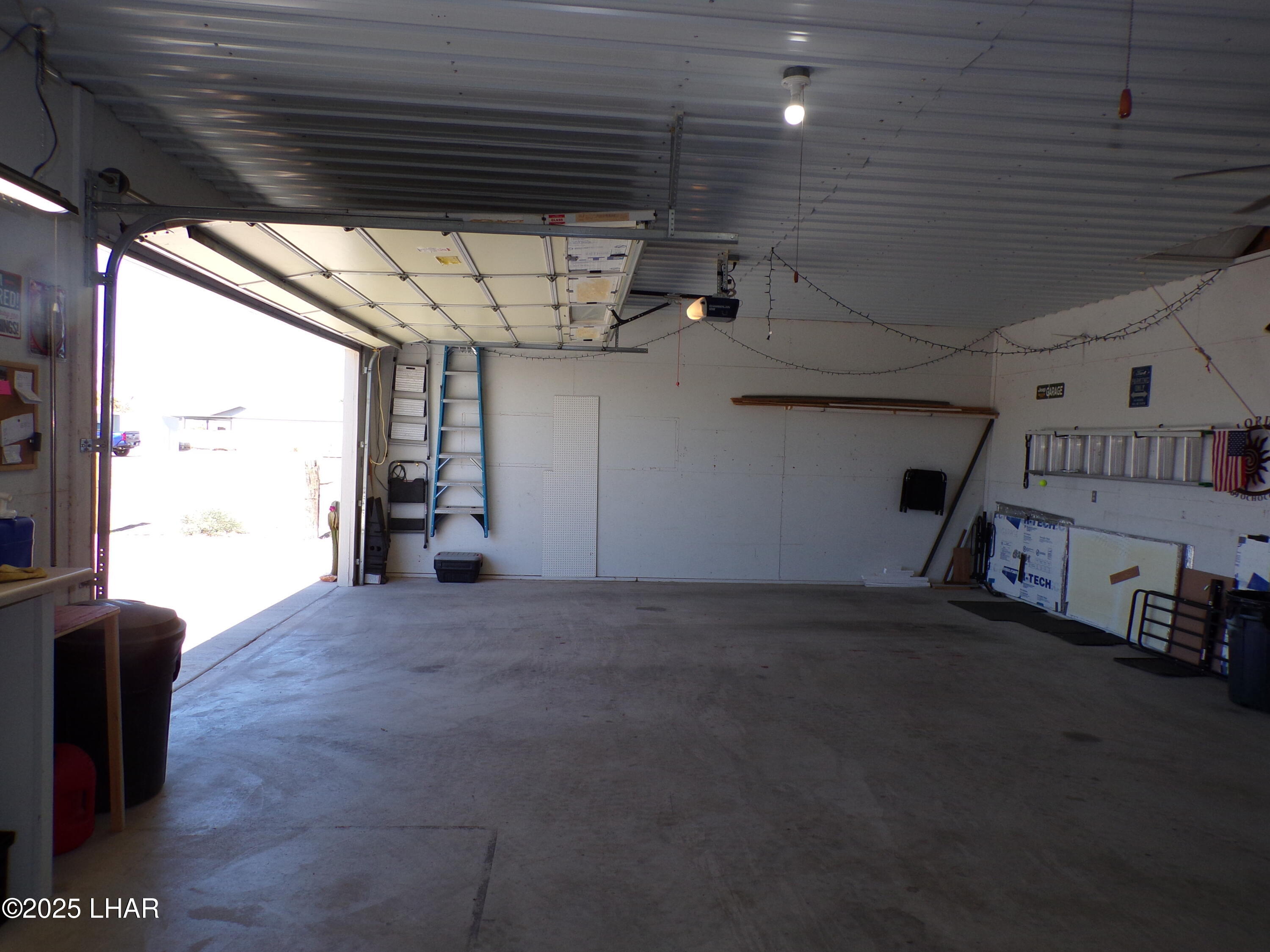 25569 Ochoco Way Bouse, AZ 85325 - Photo 35 of 71 INTERIOR GARAGE DOOR OPEN VIEW