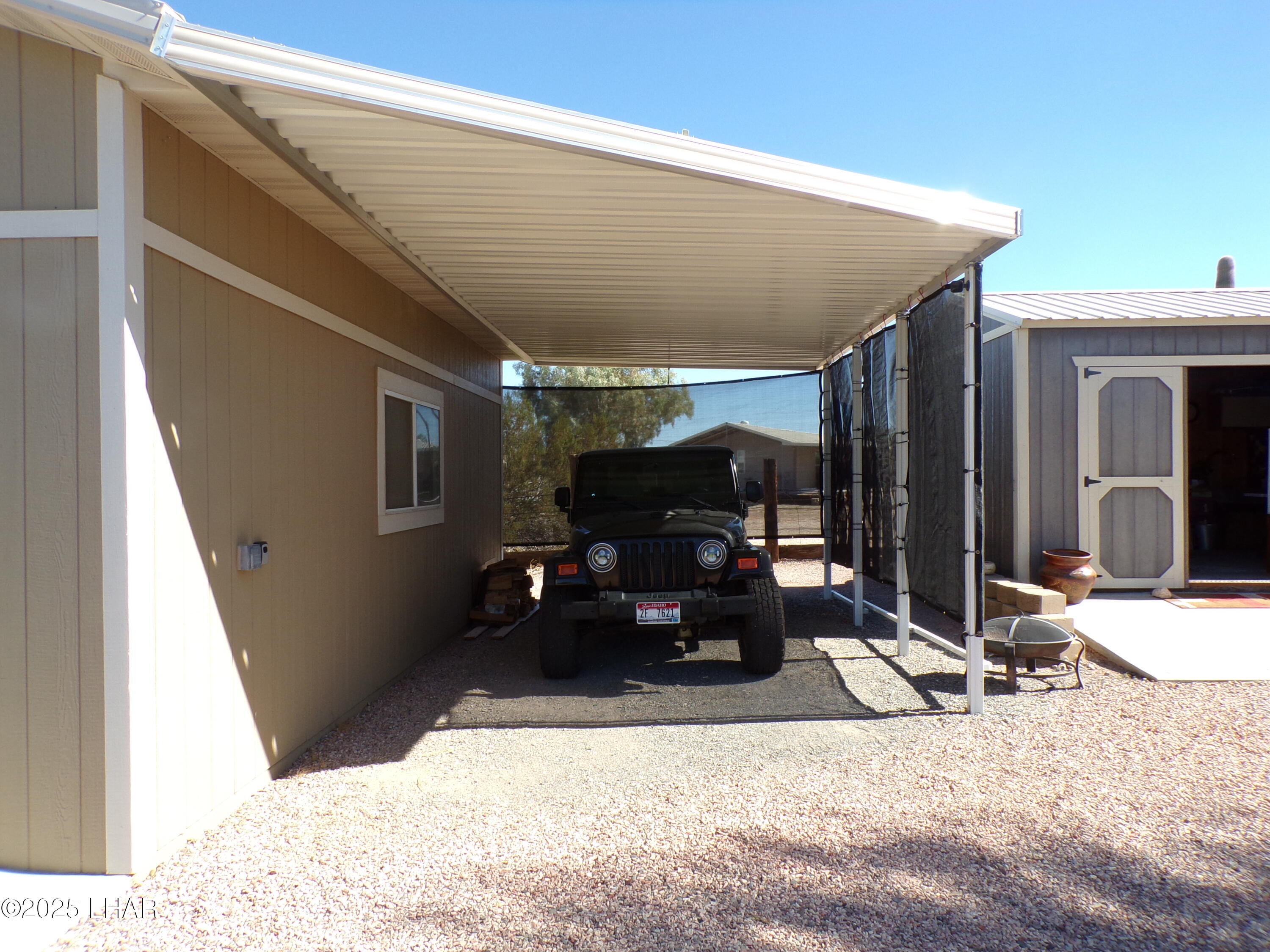 25569 Ochoco Way Bouse, AZ 85325 - Photo 36 of 71 GARAGE EAST SIDE CARPORT