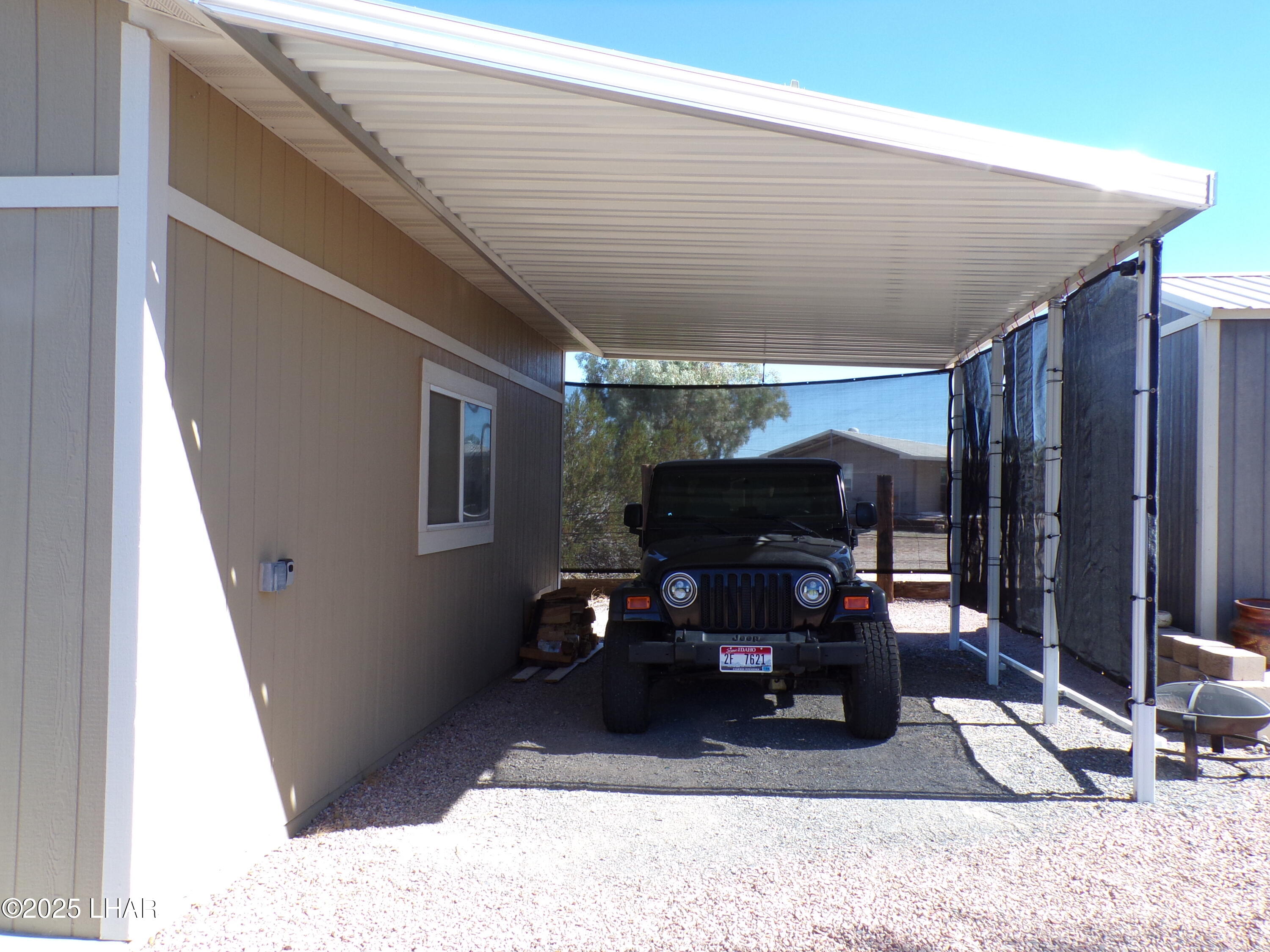 25569 Ochoco Way Bouse, AZ 85325 - Photo 37 of 71 GARAGE EAST SIDE CARPORT