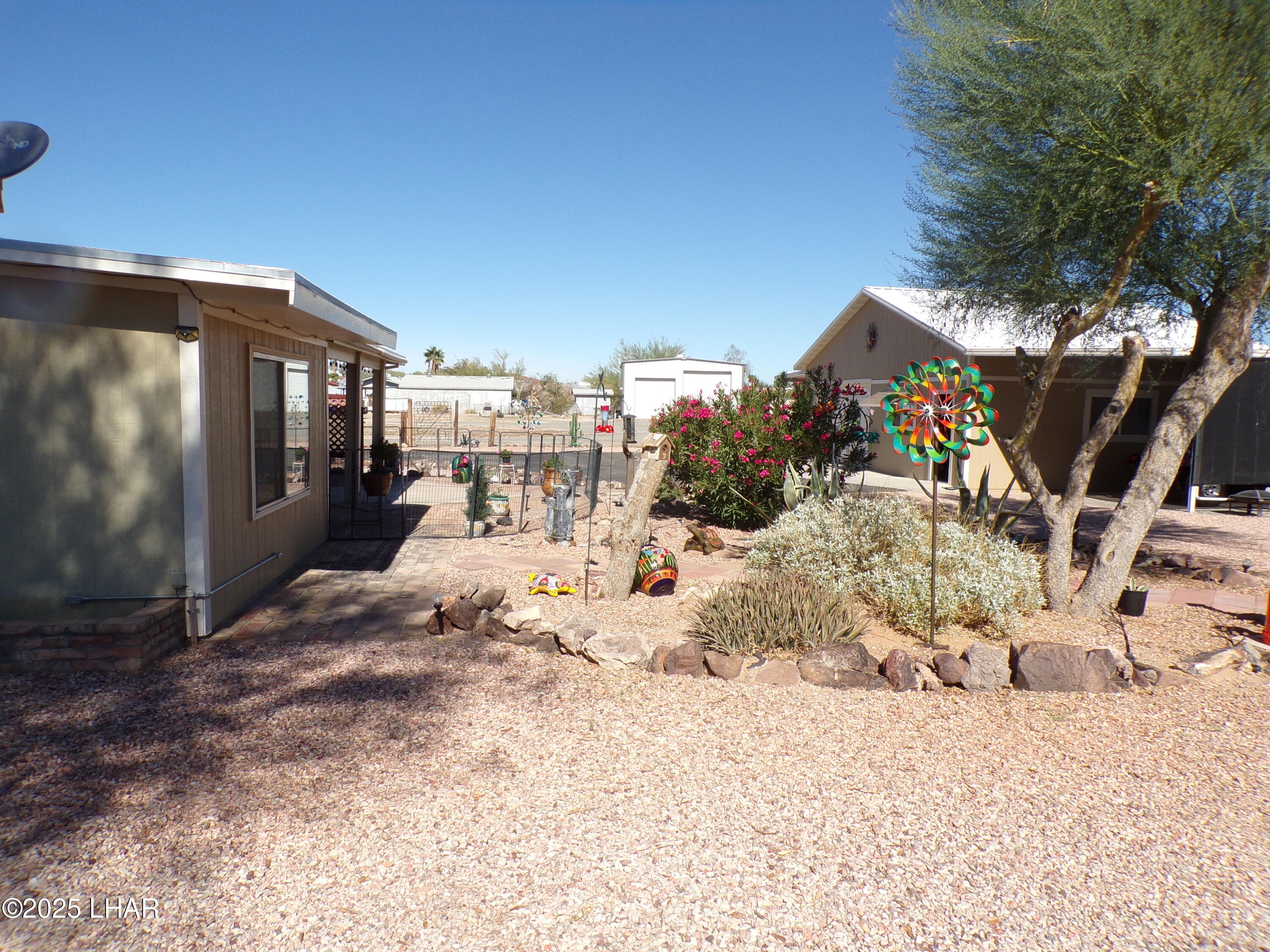 25569 Ochoco Way Bouse, AZ 85325 - Photo 61 of 71 BACK VIEW TO HOME AND GARAGE