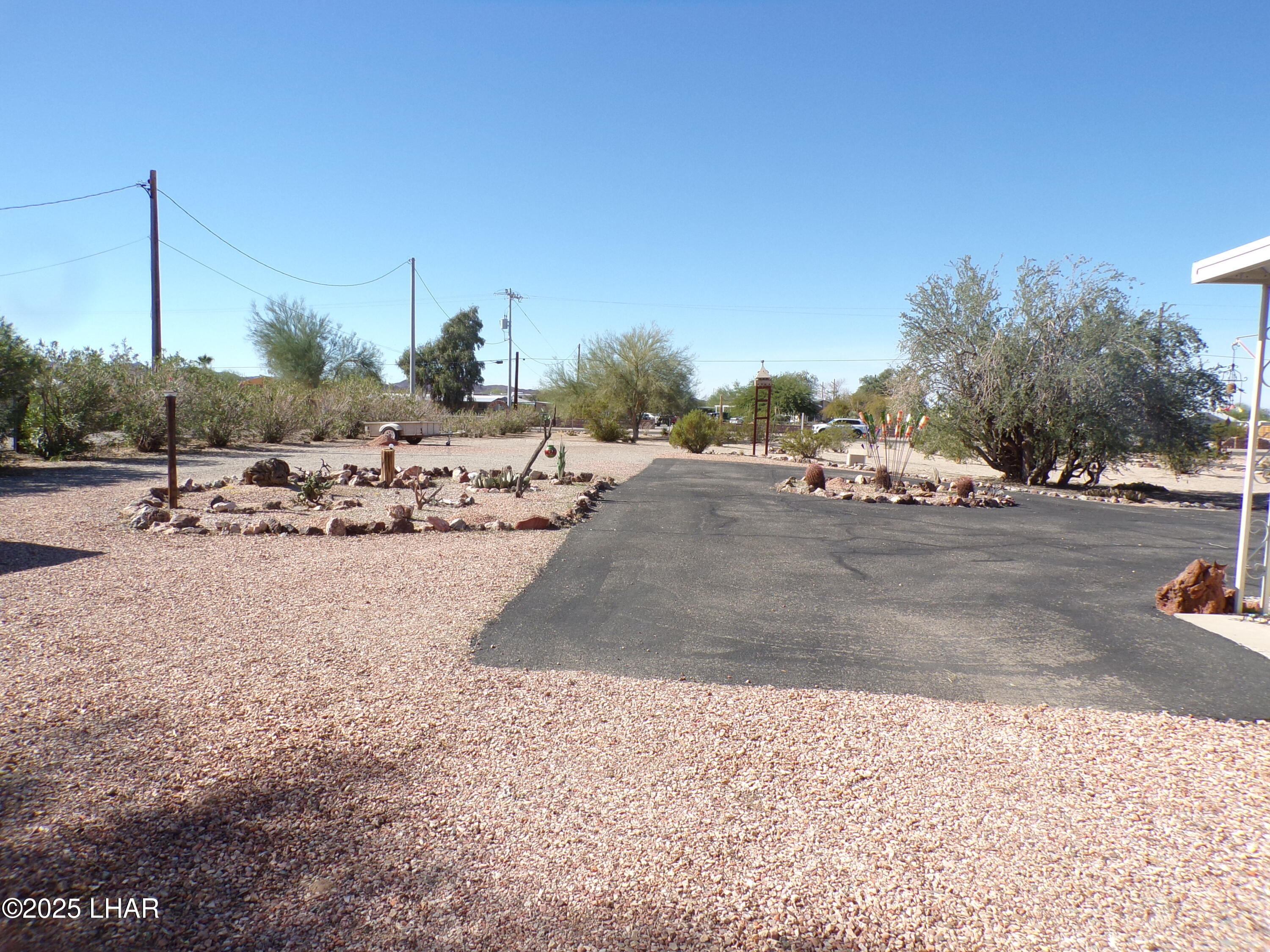 25569 Ochoco Way Bouse, AZ 85325 - Photo 62 of 71 ASPHALT ENTRY VIEW FOR RIGS