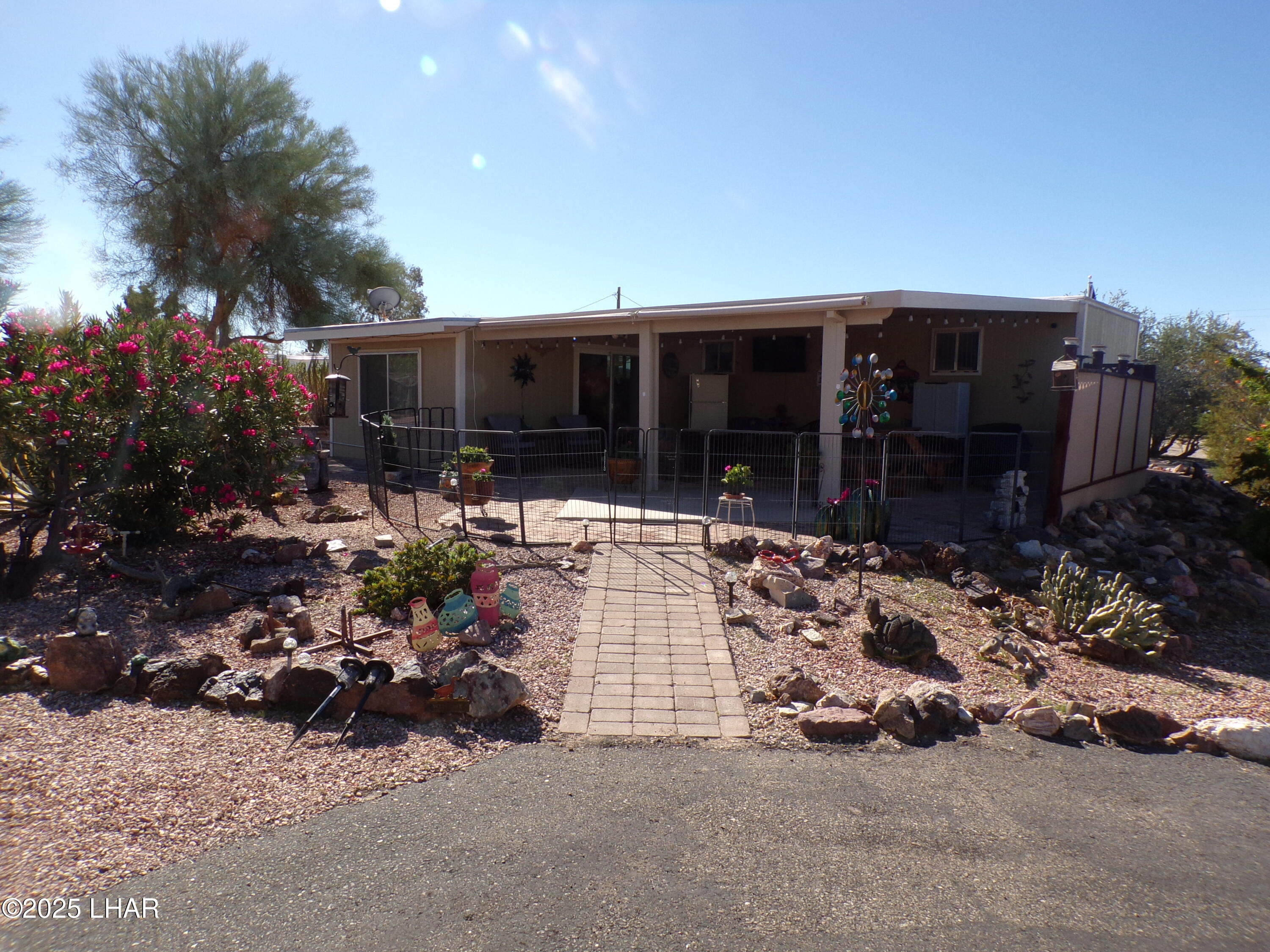 25569 Ochoco Way Bouse, AZ 85325 - Photo 67 of 71 BRICK WALKWAY TO BACK PATIO