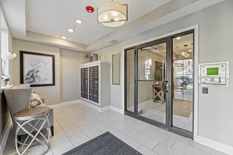 a view of livingroom with furniture and windows