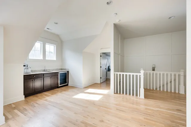 a view of a kitchen with a sink and a stove