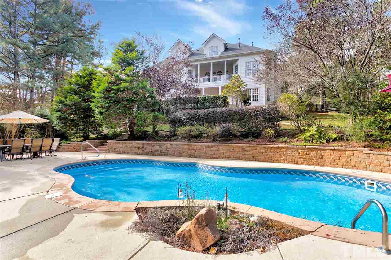 2521 Hunters Meadow Lane Raleigh, NC 27606 - Photo 29 of 30 a view of a house with swimming pool