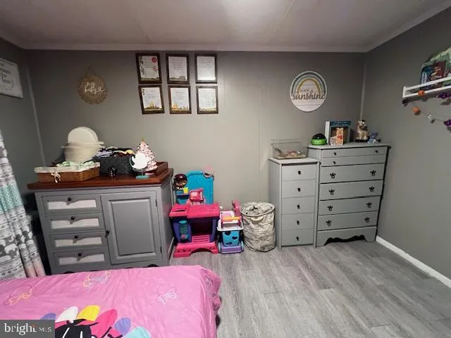 a bedroom with a bed and cabinets