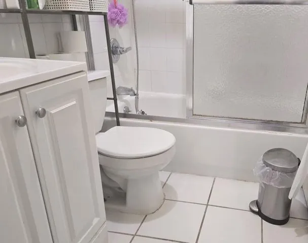 a bathroom with a sink and toilet