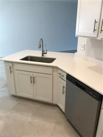 a utility room with a sink