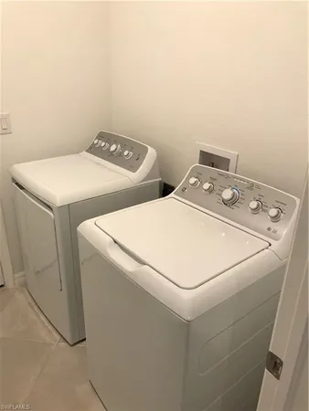 a view of a backyard of the house