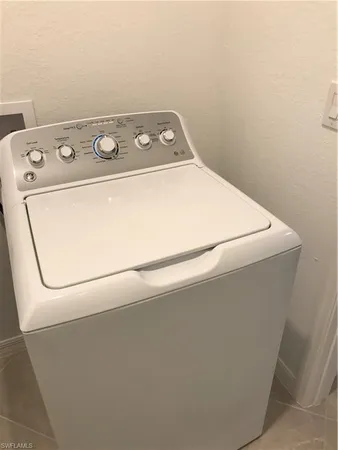 a house view with a backyard space