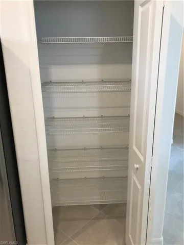 a stove top oven sitting inside of a kitchen