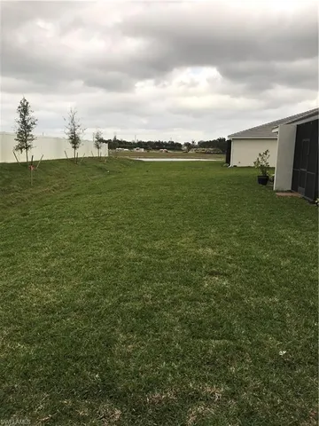 a view of an ocean from a yard