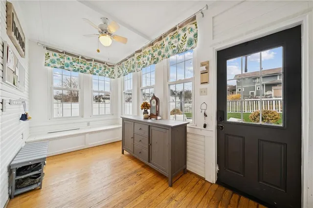 a en suite bathroom with a granite countertop sink and a mirror