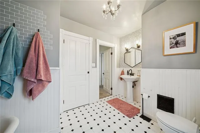 a view of a patio with couches and potted plants