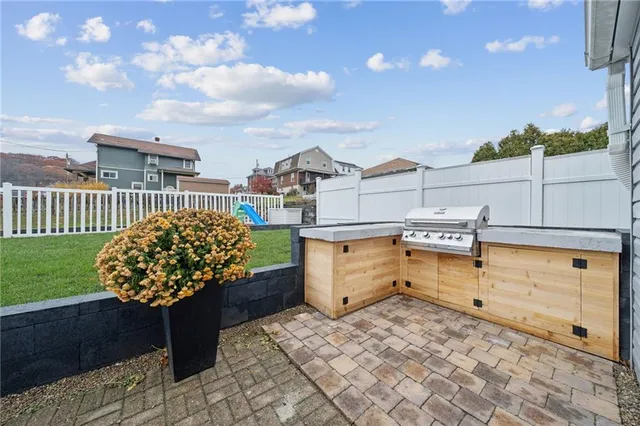 aerial view of a house with outdoor space