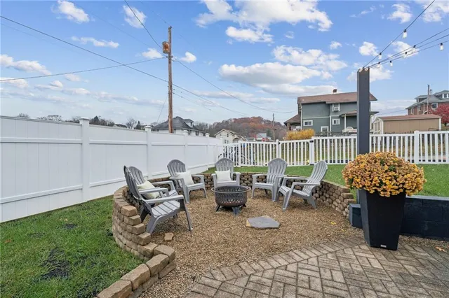 an aerial view of a house with a outdoor space