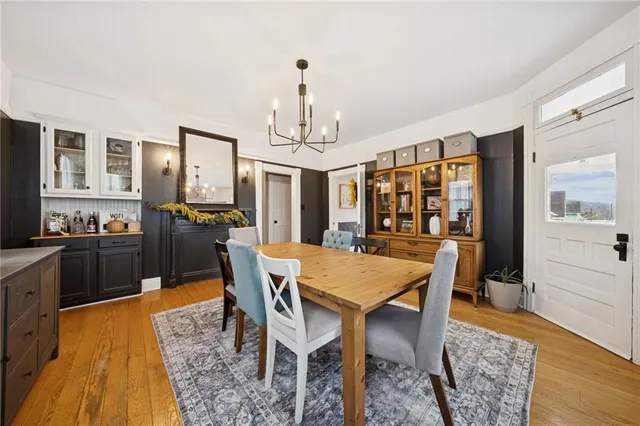 a kitchen with stainless steel appliances granite countertop a refrigerator stove and sink