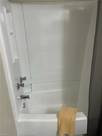 a bathroom with a bathtub
