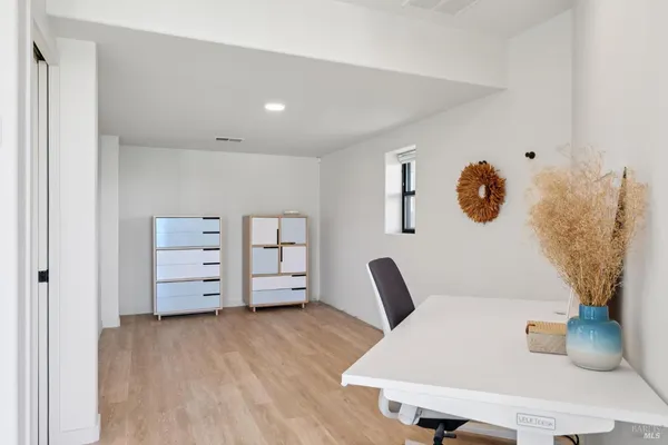 a view of a dining room with furniture window and outside view