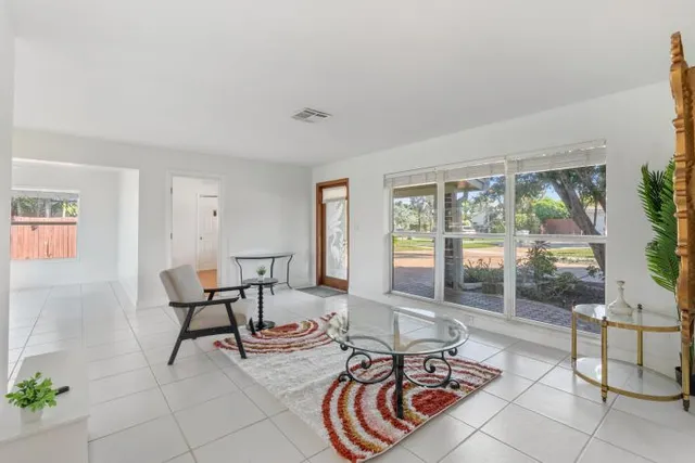 a living room with furniture and a window