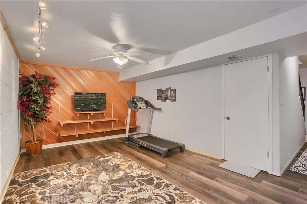 236 Timber Drive Trafford, PA 15085 - Photo 14 of 16 a living room with a couch and a rug