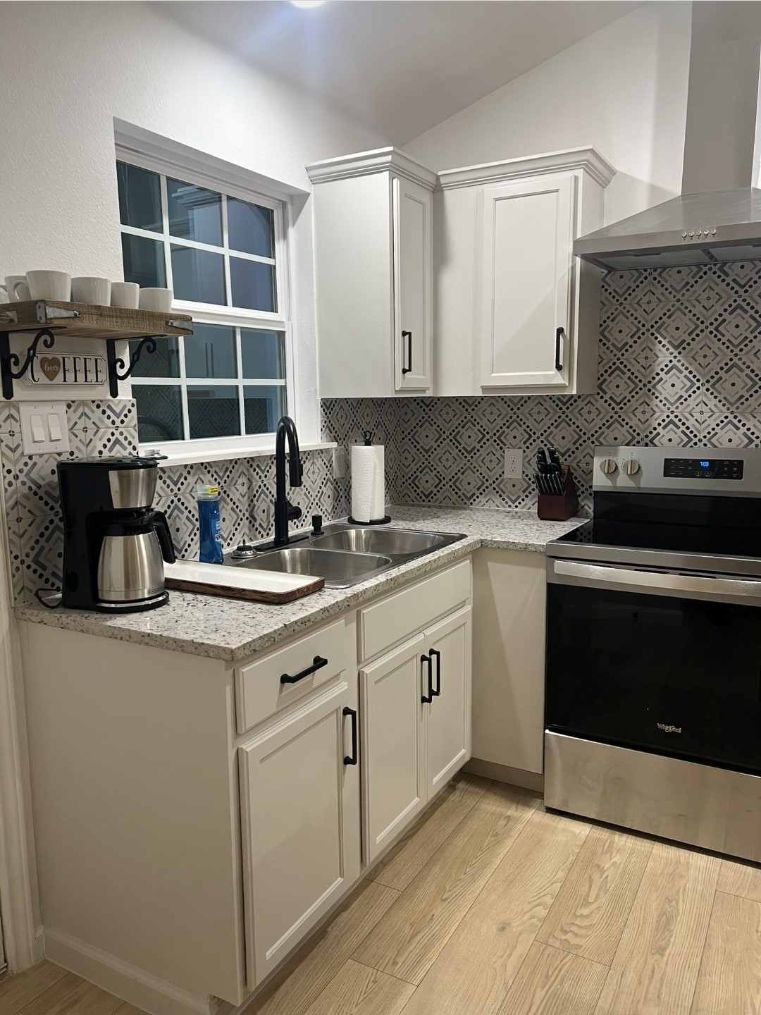 620 St Lawrence River Road Conroe, TX 77316 - Photo 5 of 21 a kitchen with a sink and cabinets