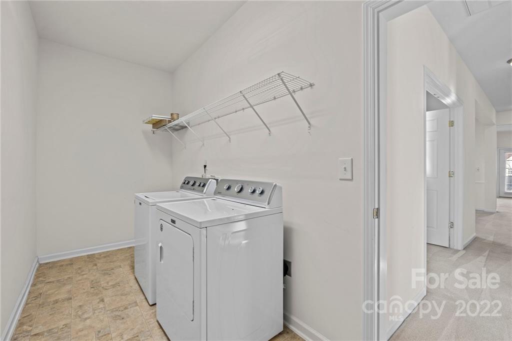 220 Garnet Court Fort Mill, SC 29708 - Photo 17 of 36 a utility room with dryer and washer