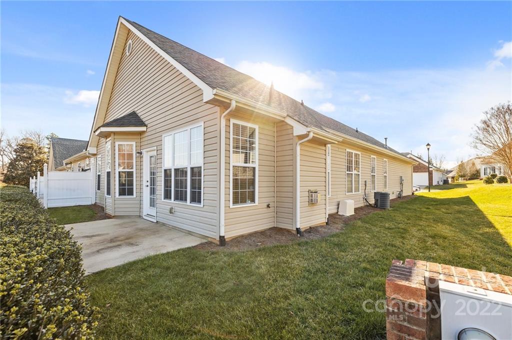 220 Garnet Court Fort Mill, SC 29708 - Photo 4 of 36 a view of a house with backyard and garden