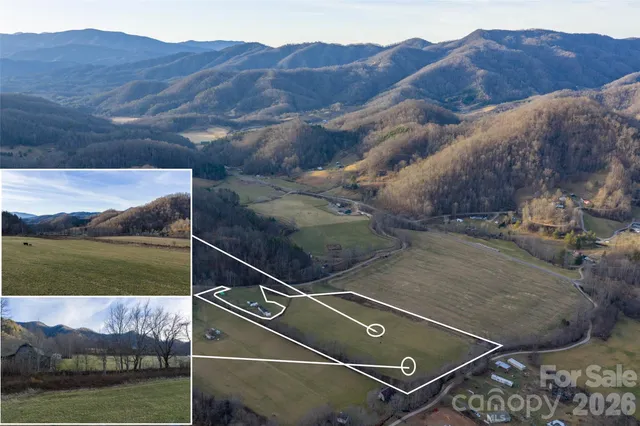 a view of a pool with a yard