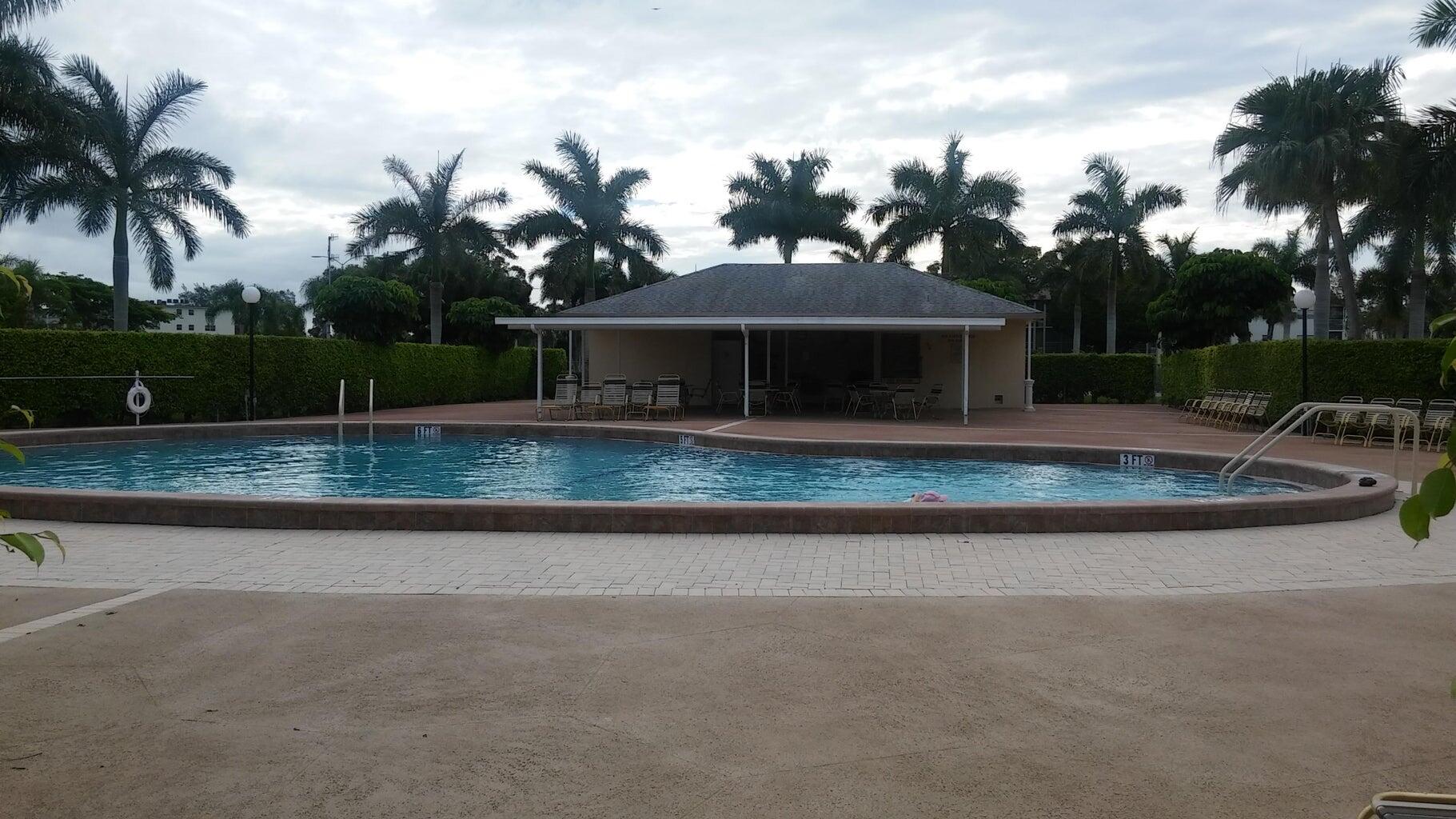 251 Fanshaw F Boca Raton, FL 33434 - Photo 14 of 14 a view of outdoor space yard and lake