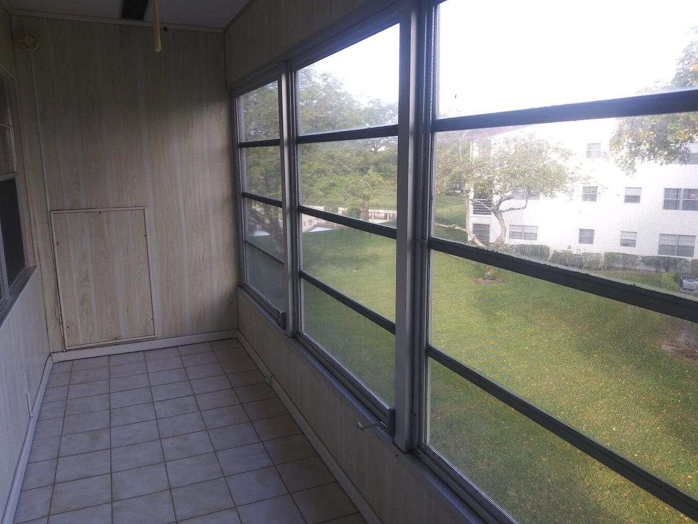 251 Fanshaw F Boca Raton, FL 33434 - Photo 10 of 14 a view of a room with window