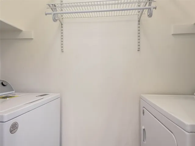 a view of a pathway with a backyard