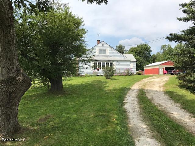 1335 Savoy Road Windsor, MA 01270 - Photo 1 of 23 a view of a house with a big yard