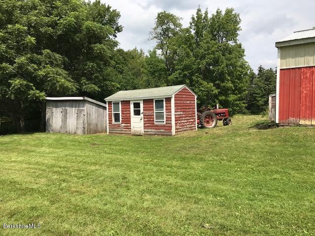 1335 Savoy Road Windsor, MA 01270 - Photo 2 of 23 a view of a house with backyard and garden
