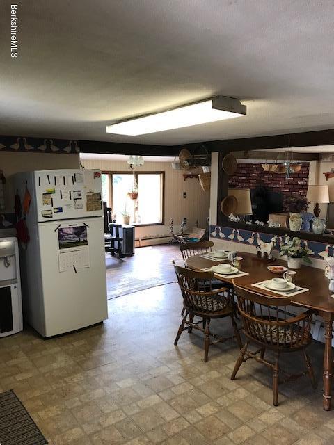 1335 Savoy Road Windsor, MA 01270 - Photo 7 of 23 a kitchen with lots of counter top space and appliances
