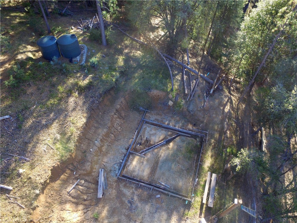 50963 Chu Ranch Road Oakhurst, CA 93644 - Photo 15 of 26 a view of a backyard of a house