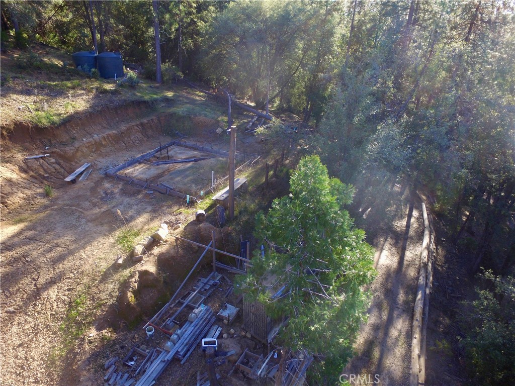 50963 Chu Ranch Road Oakhurst, CA 93644 - Photo 22 of 26 a backyard of a house