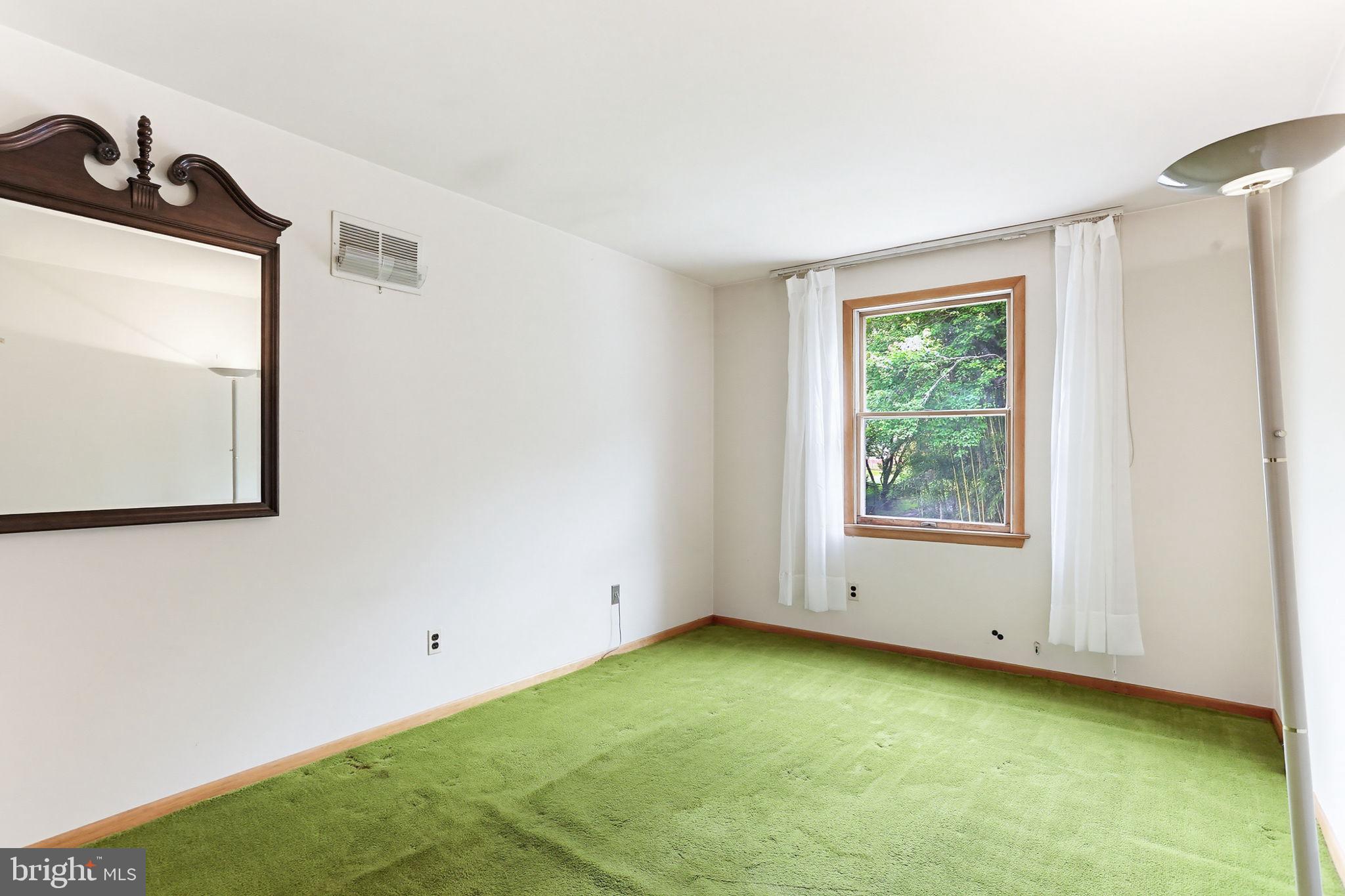 9301 Gardenia Road Baltimore, MD 21236 - Photo 23 of 37 a view of an empty room with a window