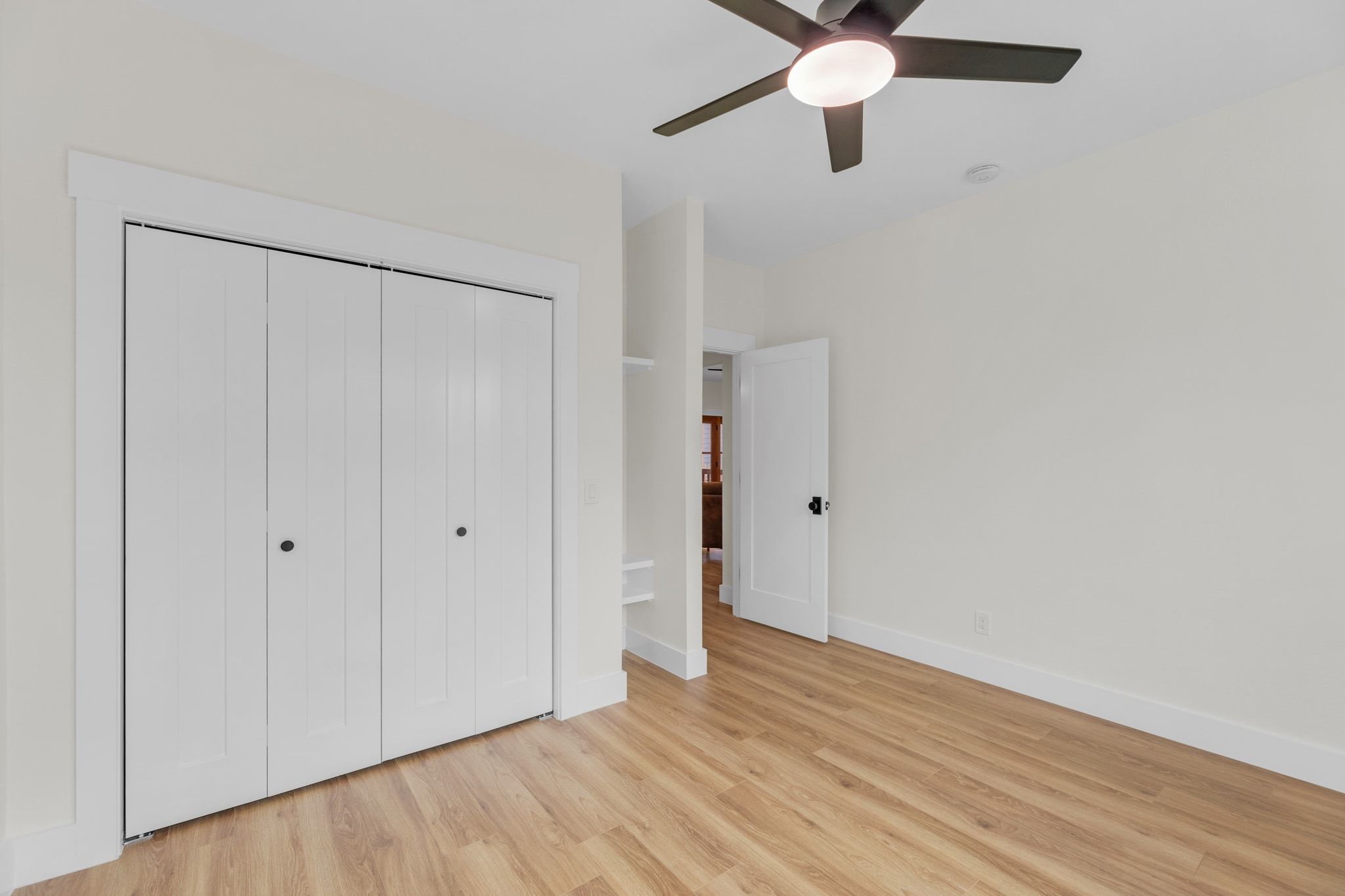 2102 South Church Street Georgetown, TX 78626 - Photo 37 of 40 One of 2 bedrooms in ADU. Ceiling fan and closet.